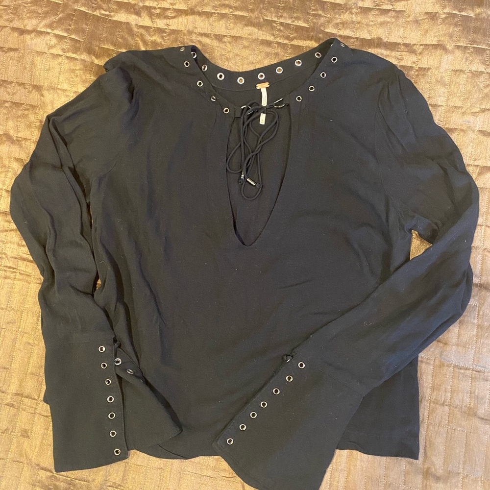 Free People trendy long sleeve top with silver grommet detailing